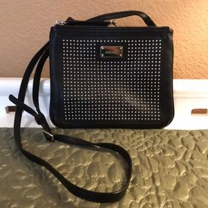 Nine West bag strap can be worn crossbody.